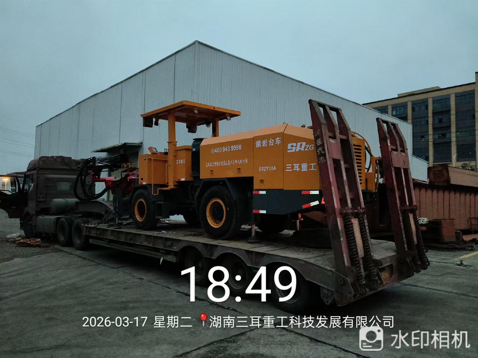 Trucked cocnrete pumop and rock drilling machine work for tunnel construction together 2 Trucked cocnrete pumop and rock drilling machine work for tunnel construction together 2