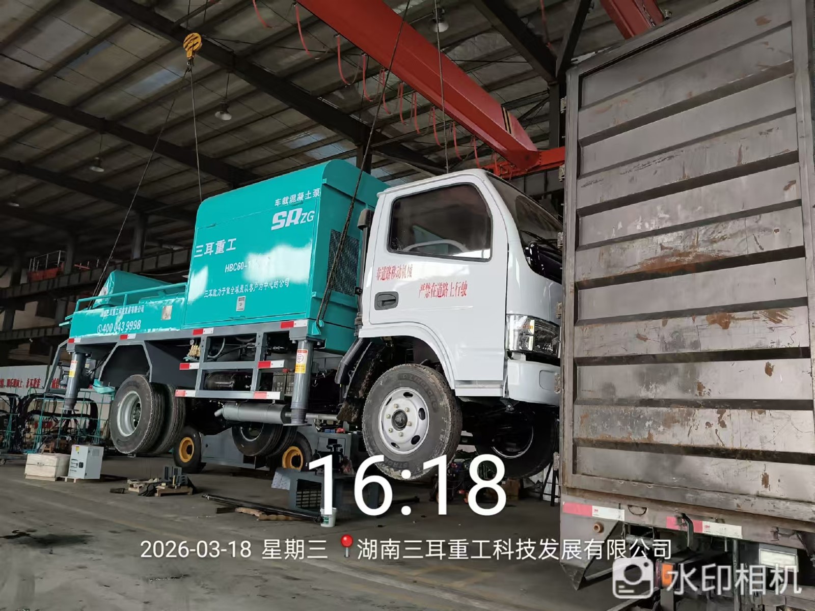 Trucked cocnrete pumop and rock drilling machine work for tunnel construction together 2 Trucked cocnrete pumop and rock drilling machine work for tunnel construction together 2